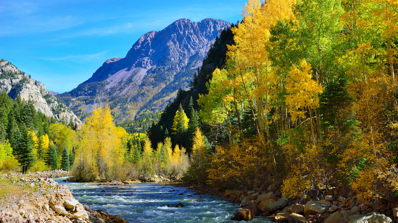 river and colourful mountains of Colorado during foliage season