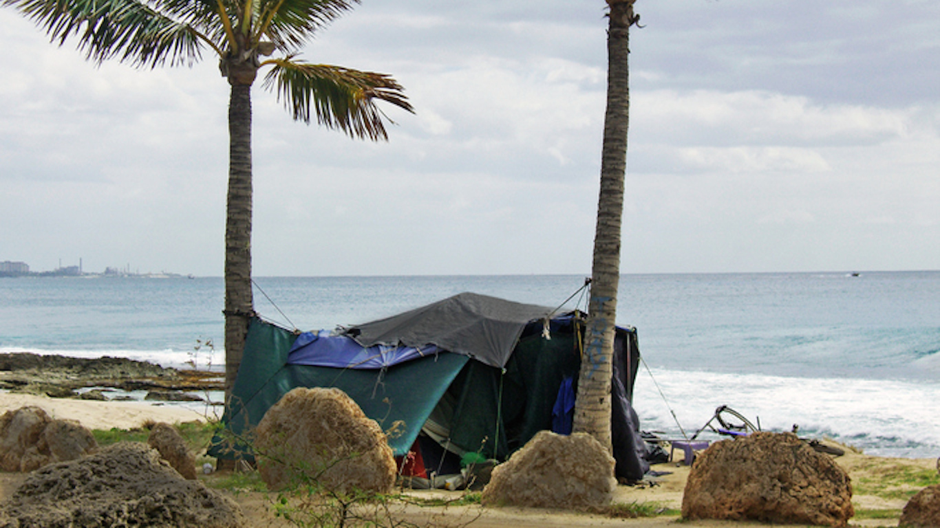 Makaha, Oahu, Hawaii....homeless shelter on the beach strung between two coconut palms.