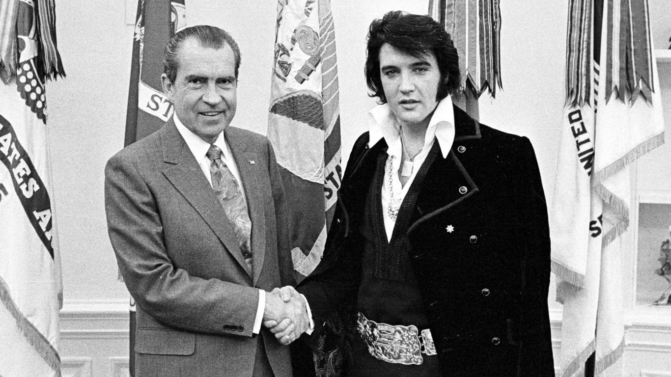 Richard Nixon shaking hands with Elvis Presley