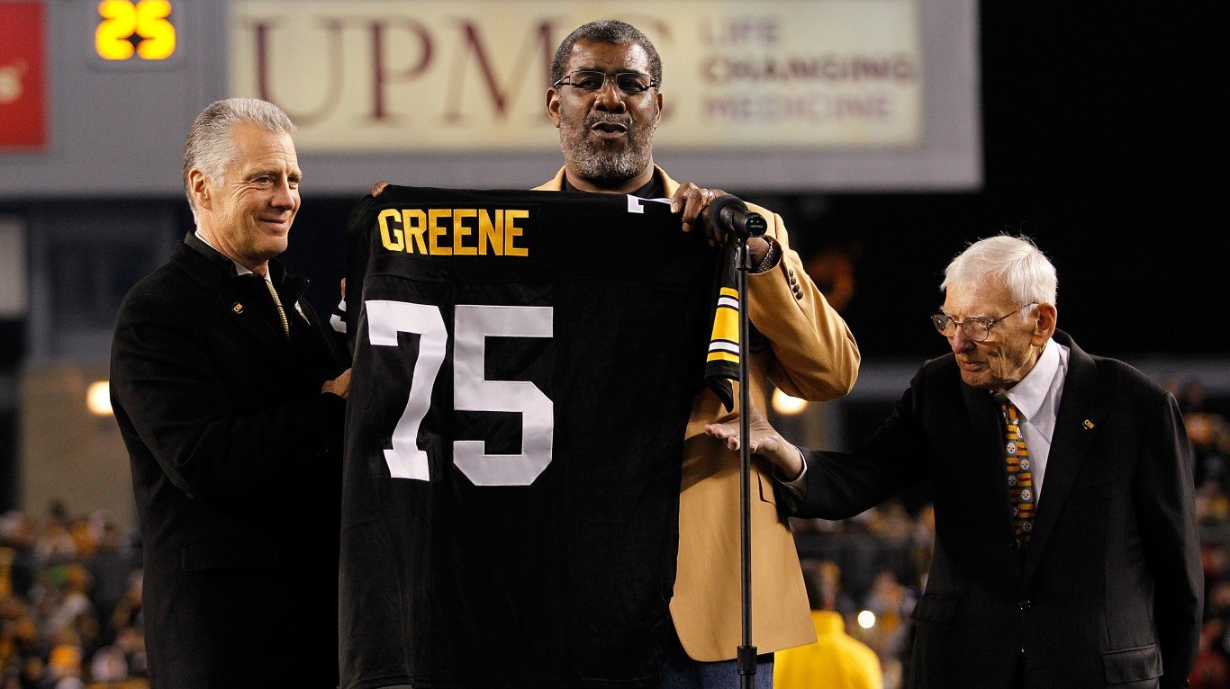 PITTSBURGH, PA - NOVEMBER 02:  Former Pittsburgh Steelers defensive tackle Joe Greene #75 has his number retired during a ceremony with Steelers President Art Rooney ll (L) and Chairman Dan Rooney (R) during halftime against the Baltimore Ravens at Heinz Field on November 2, 2014 in Pittsburgh, Pennsylvania.  (Photo by Justin K. Aller/Getty Images)