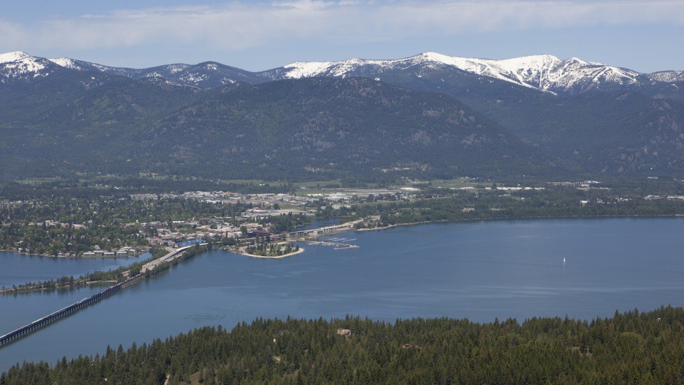 'Overlooking the town of Sandpoint, Idaho. Lake Pend Oreille is in the foreground, with a train crossing the Long Bridge. Schweitzer Mountain is seen in the background.'