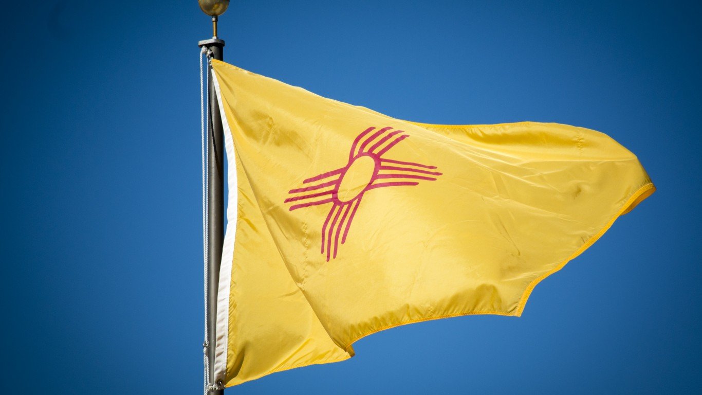 The New Mexico State flag blowing in the wind.