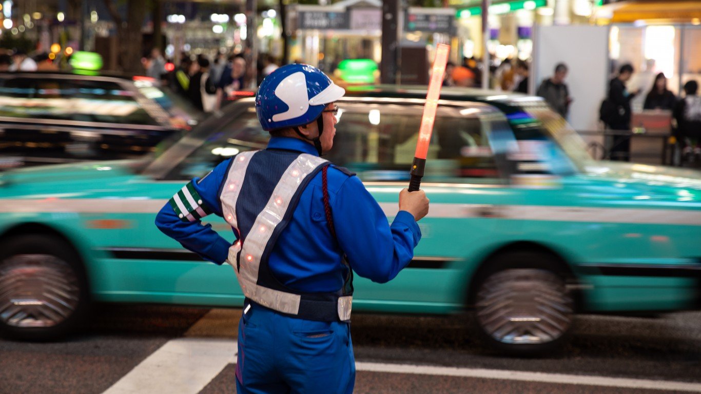 Traffic Officer - Tokyo, Japan by Espen Faugstad