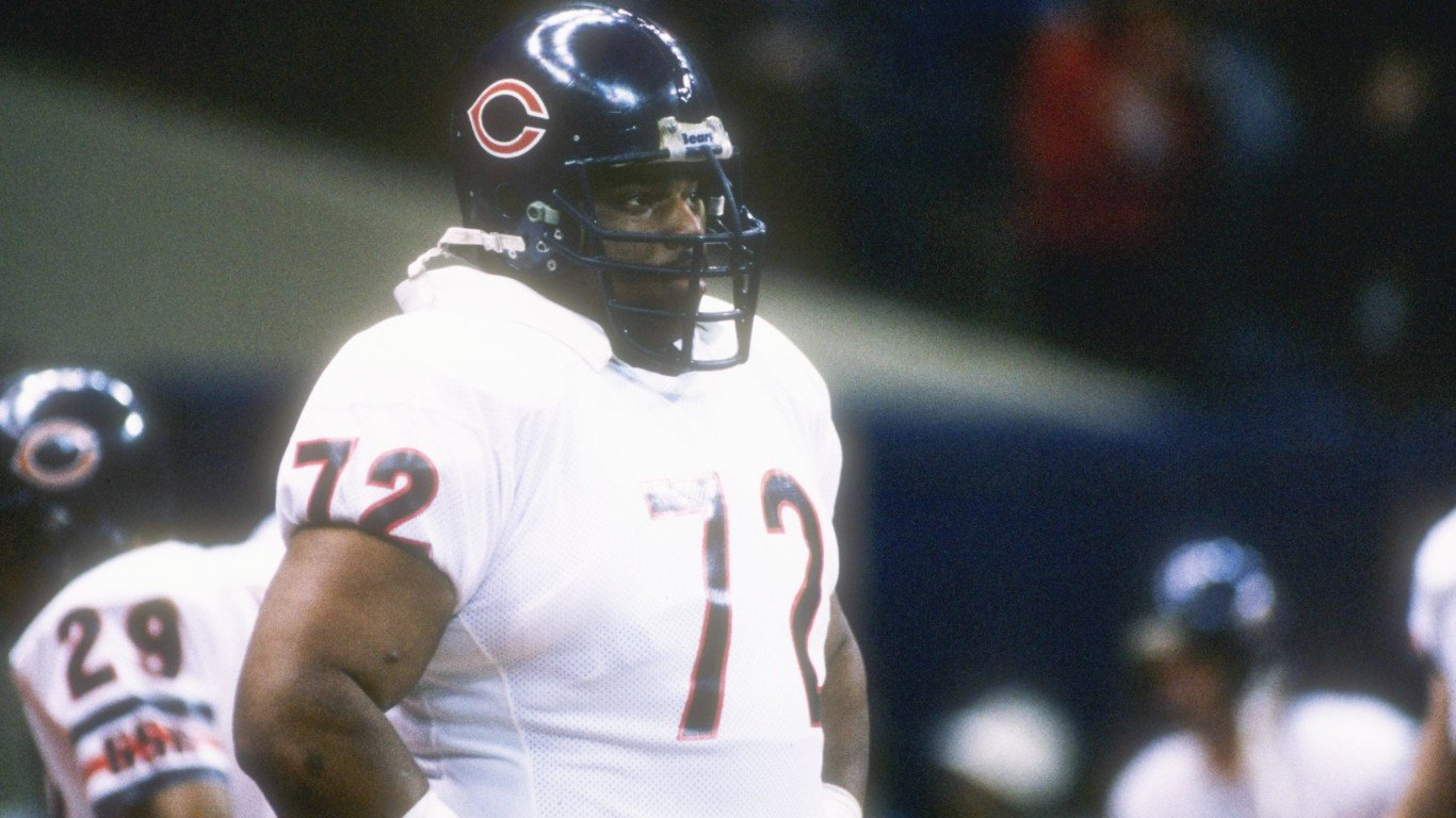 26  Jan 1986:  Defensive lineman William (Refrigerator) Perry of the Chicago Bears watches  from the side during the Super Bowl  XX  game with the New England Patriots at the Louisiana Superdome in New Orleans, Louisiana.  The Bears won the game, 46-10.