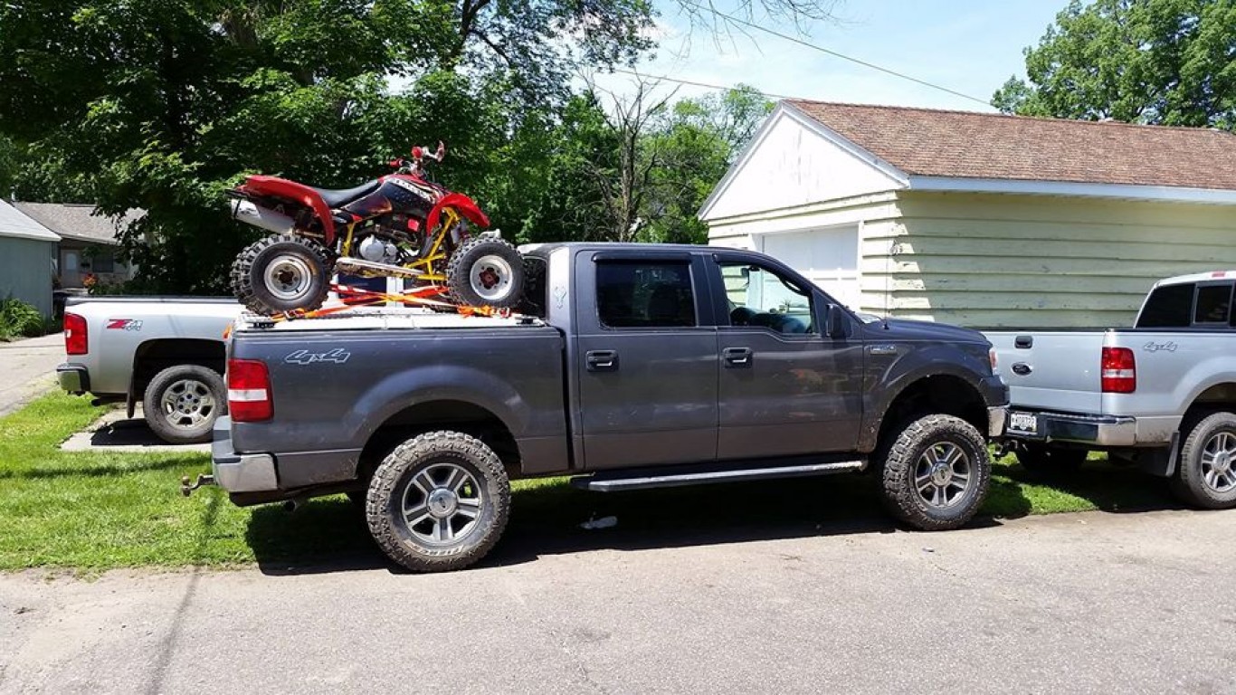 An ATV Carrier on a Ford F150 by DiamondBack Covers