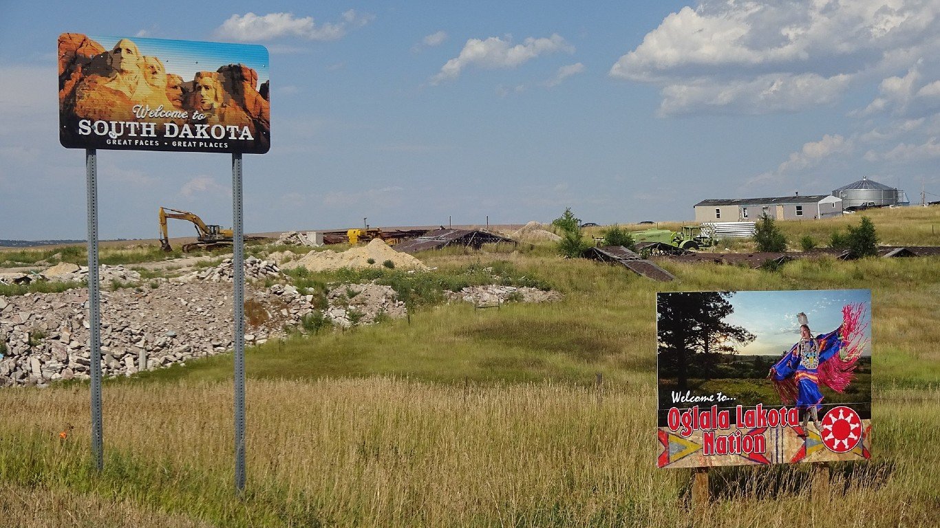 Welcome to South Dakota and Oglala Lakota Nation signs by Steve Elliott