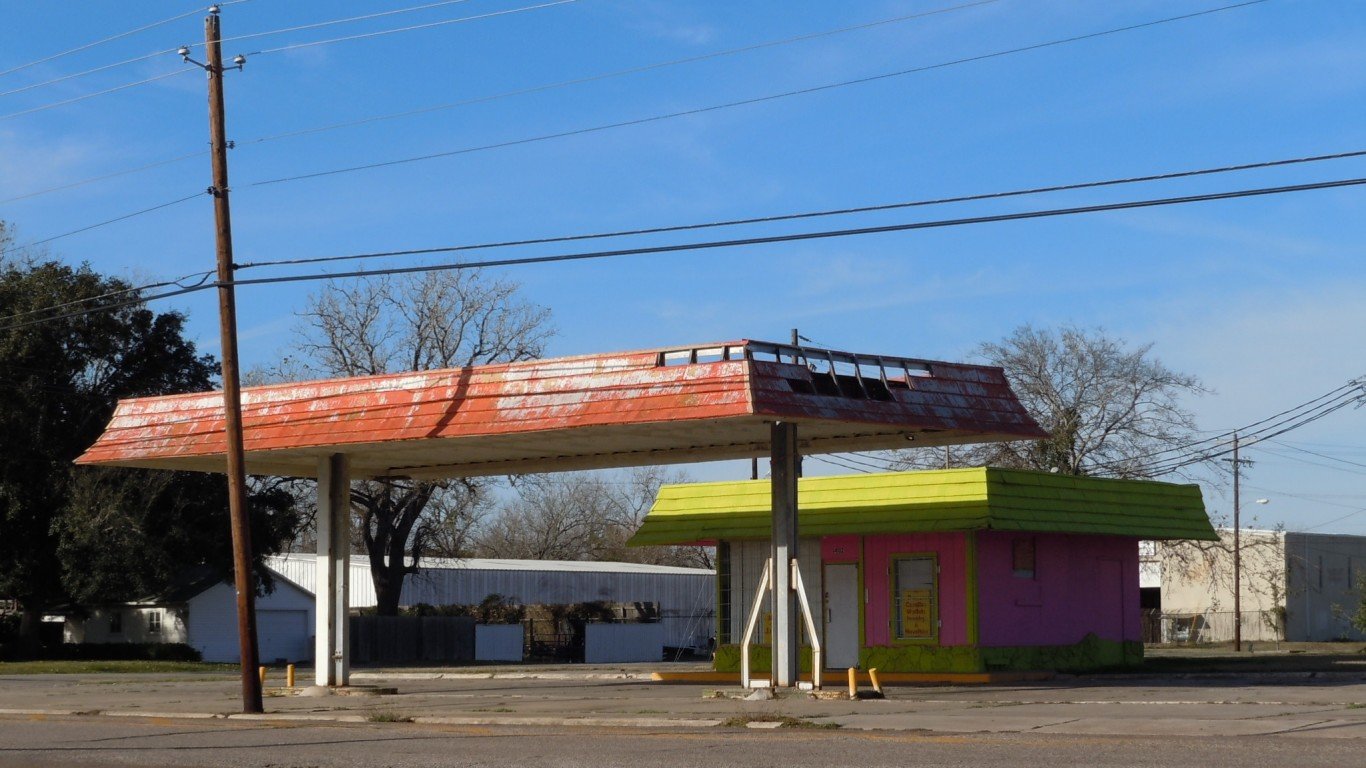 Abandoned colorful gas station by Matthew Rutledge
