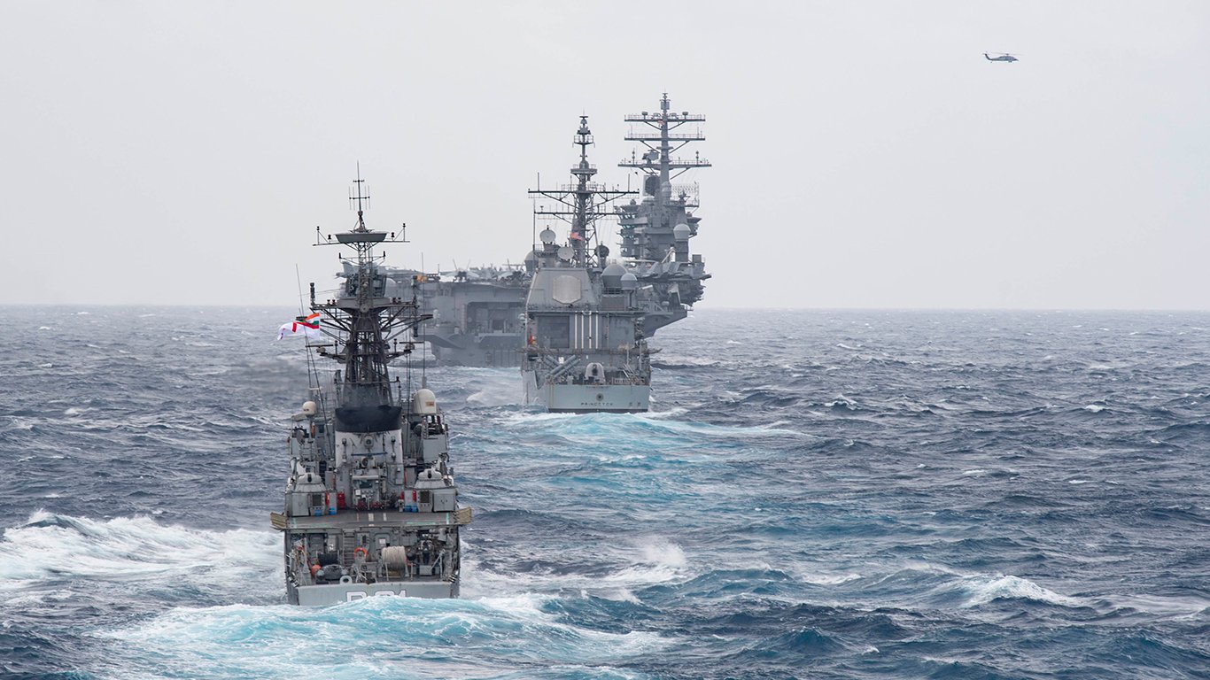 The Kora-class corvette INS Kora (P 61) steams behind the guided-missile cruiser USS Princeton (CG 59) and the aircraft carrier USS Nimitz (CVN 68) during Malabar 2017 by Naval Gazer