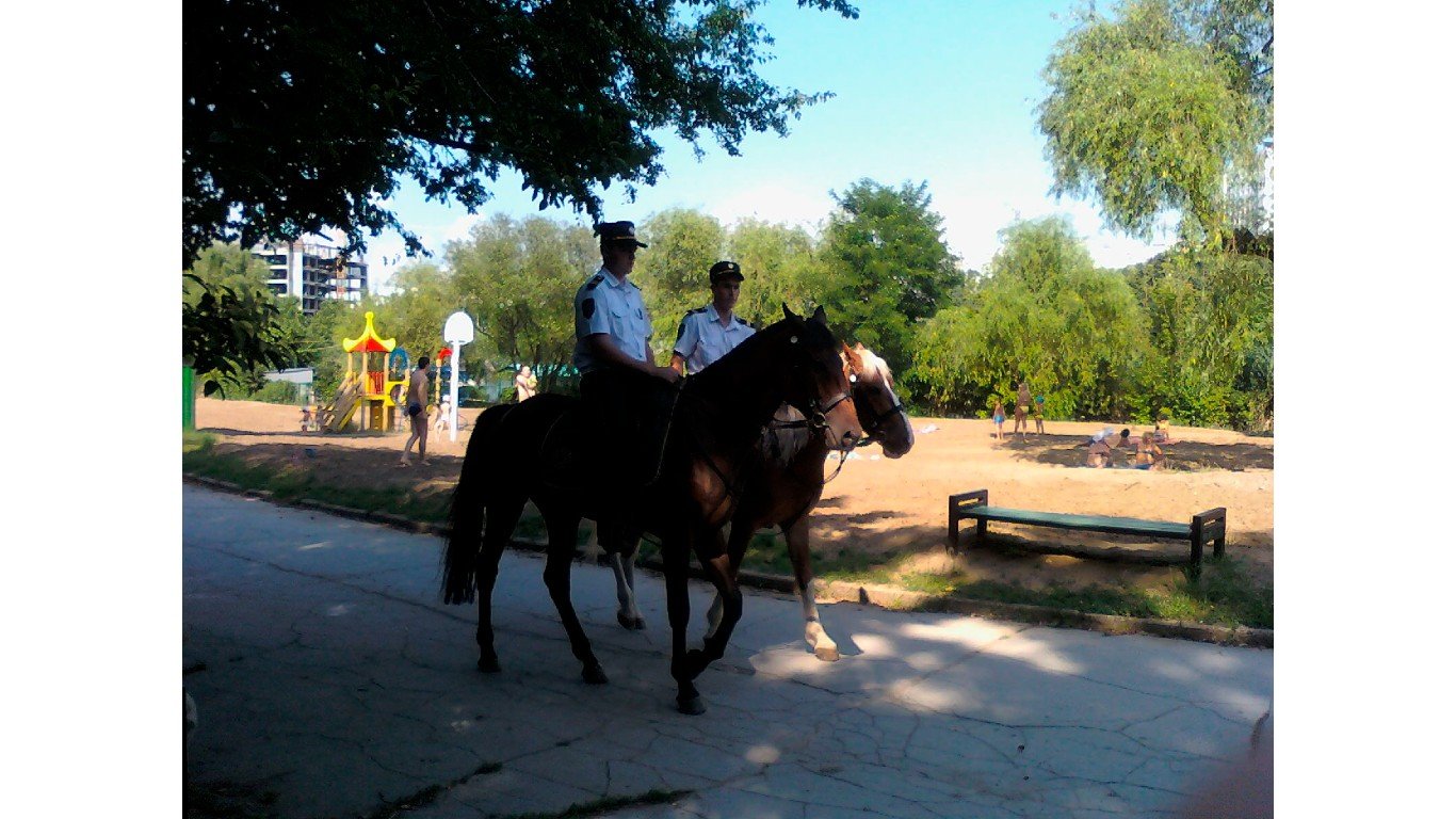 Mounted Moldavian police in a park by DGrozdanov