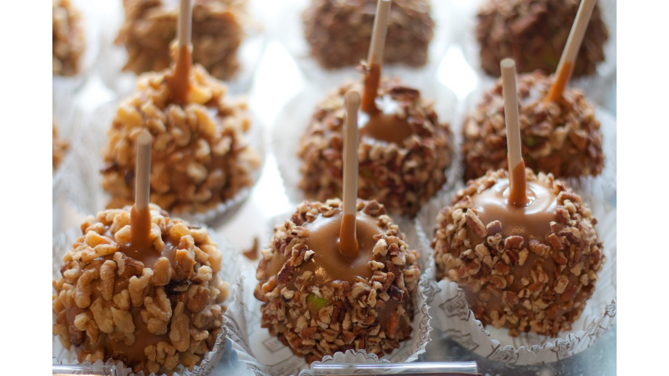 Caramel apples with nuts by Neil Conway