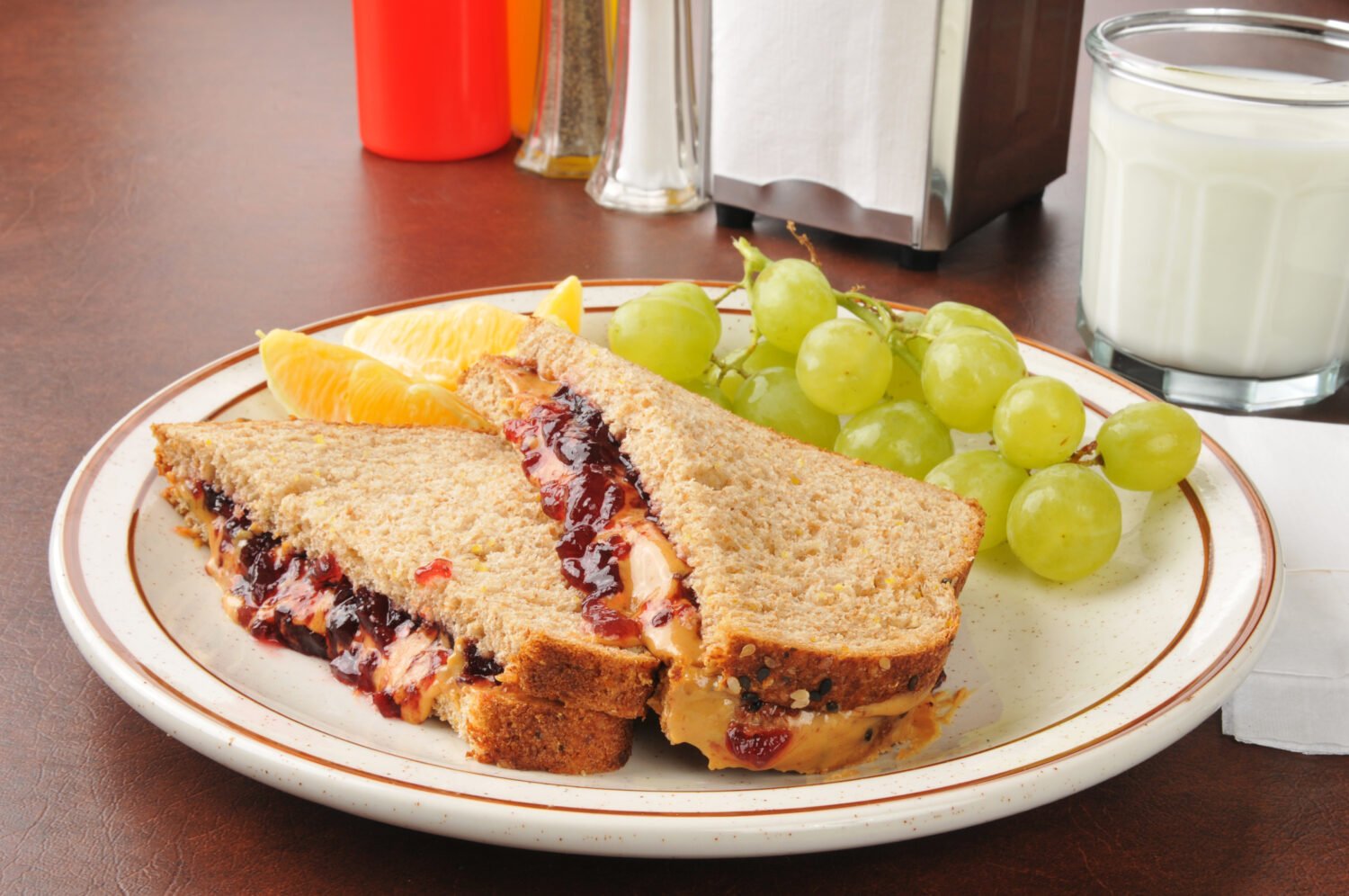 A peanut butter and jelly sandwich on whole wheat bread