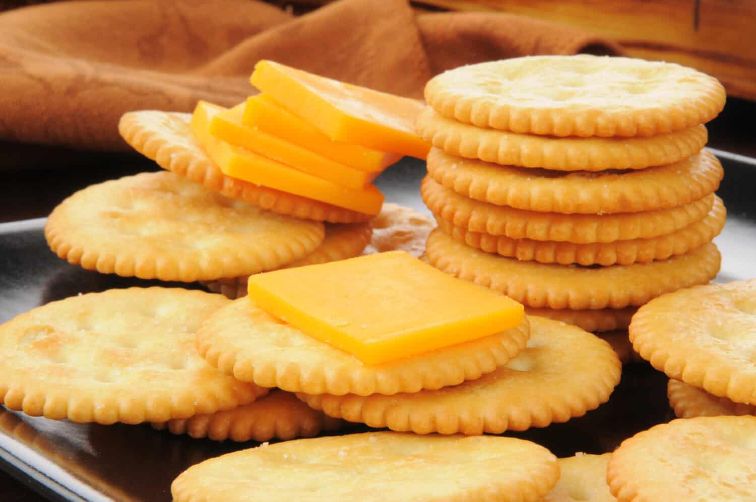Closeup of a snack plate of cheese and crackers