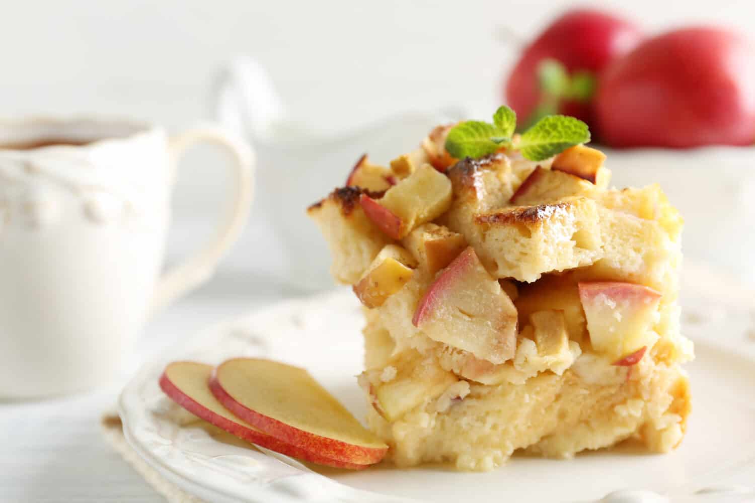 Delicious bread pudding with apple on plate