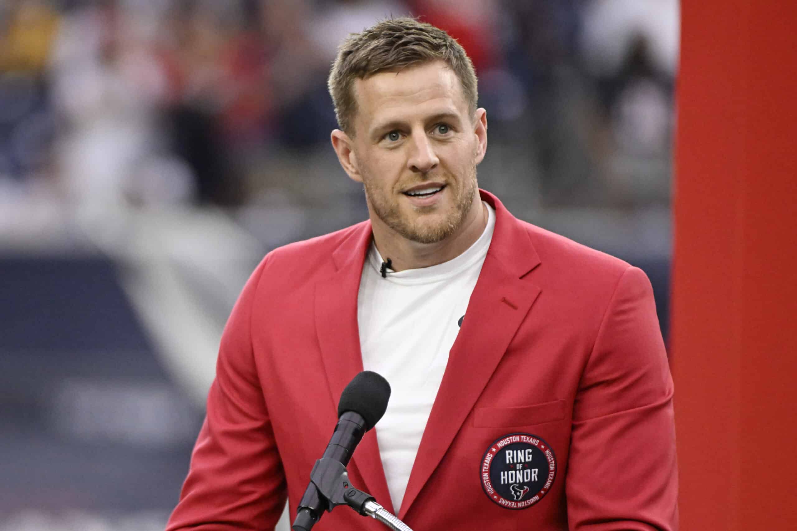 HOUSTON, TEXAS - OCTOBER 01: Former Houston Texans player J.J. Watt speaks during a ceremony inducting him into the Texans Ring of Honor during a game against the Pittsburgh Steelers at NRG Stadium on October 01, 2023 in Houston, Texas. (Photo by Logan Riely/Getty Images)