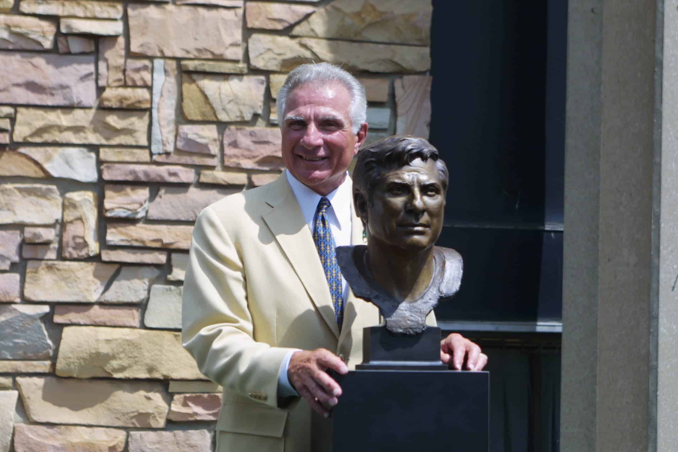 04 Aug 2001 : Nick Buoniconti poses next to his bronze bust during the 2001 Induction Ceremony at Hall's Game Day Theater in Canton, Ohio. DIGITAL IMAGE.Mandatory Credit: Tom Pidgeon/Allsport