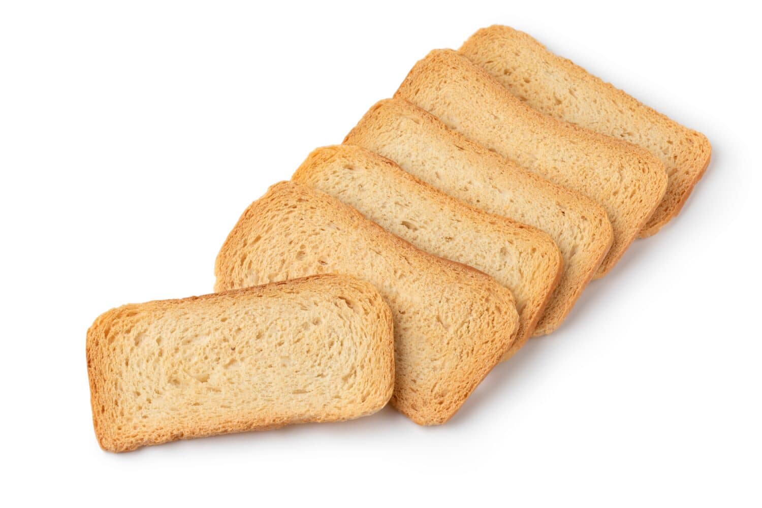 Heap of melba toast isolated on white background