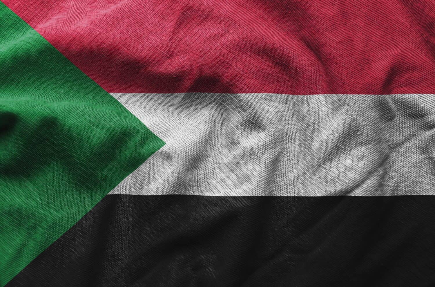 Close up of the Sudan flag. 