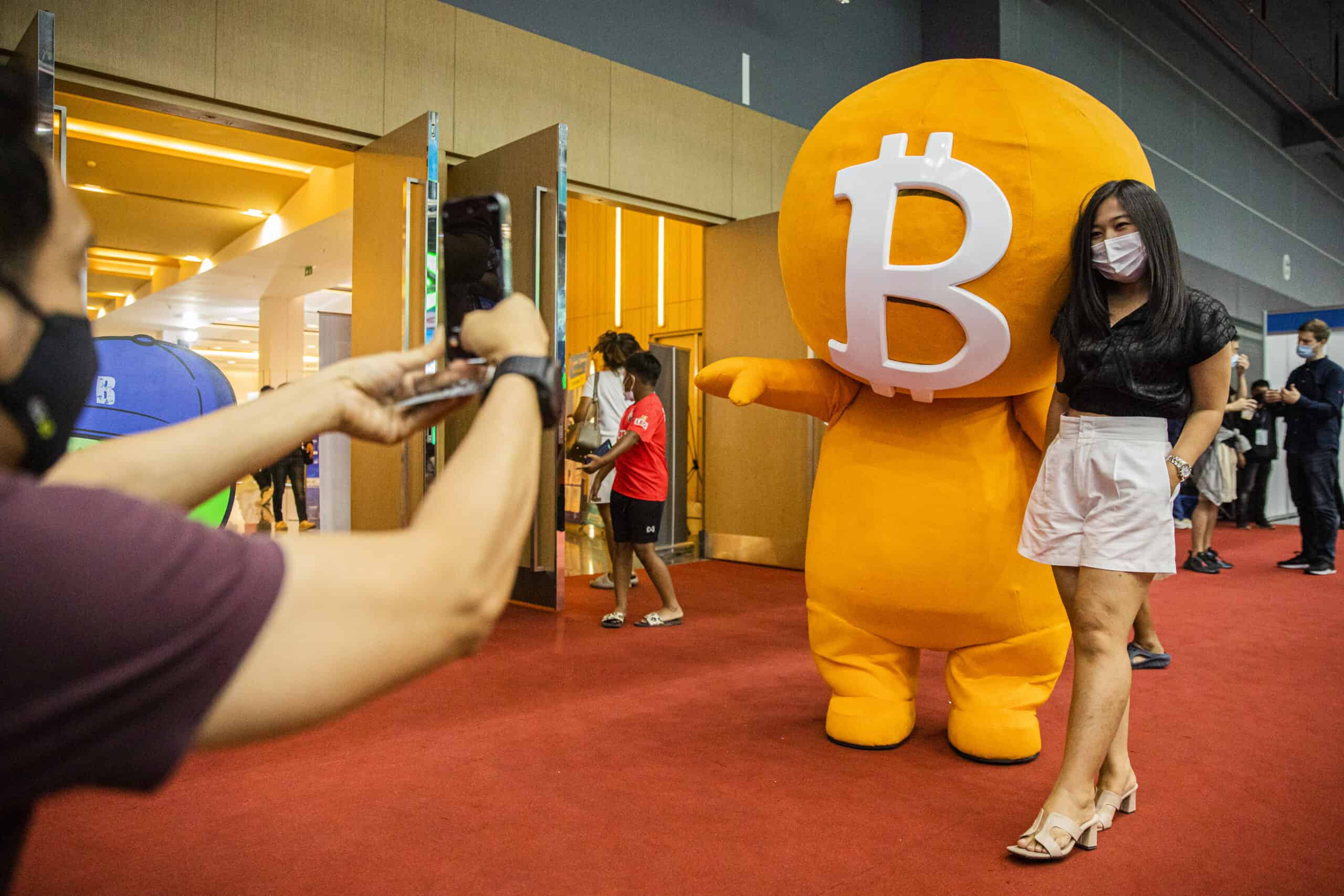 People Attend Crypto Expo Amid Huge Drop In Valuations