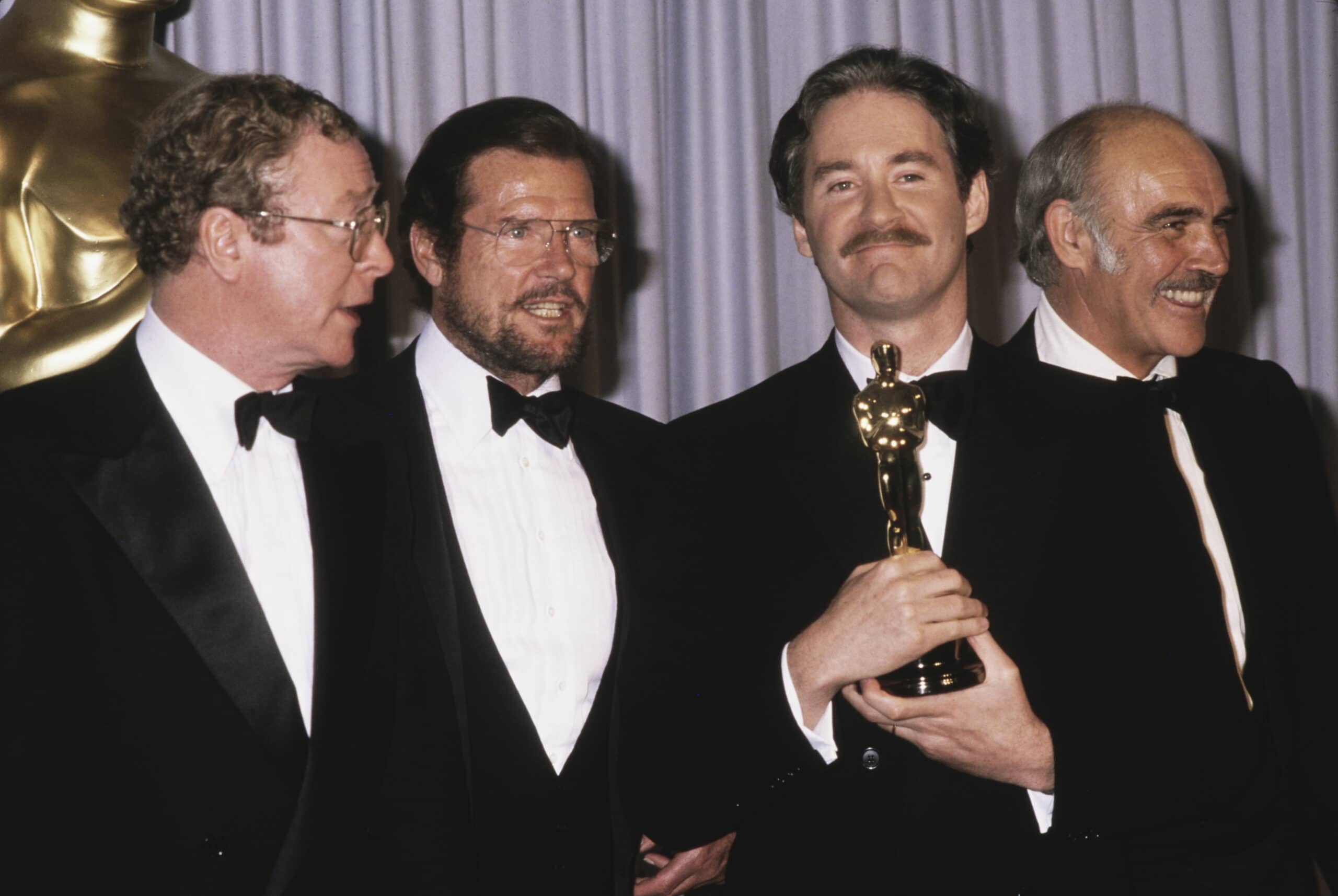 Michael Caine, Roger Moore, Kevin Kline And Sean Connery Attends 1989 Annual Academy Awards