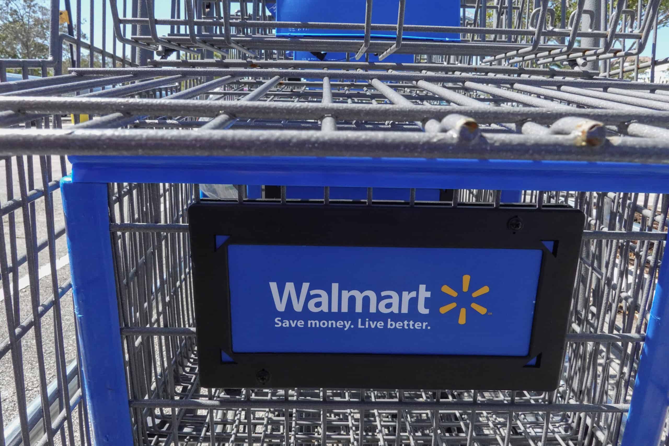 A Walmart Supercenter cart sits outside of the store