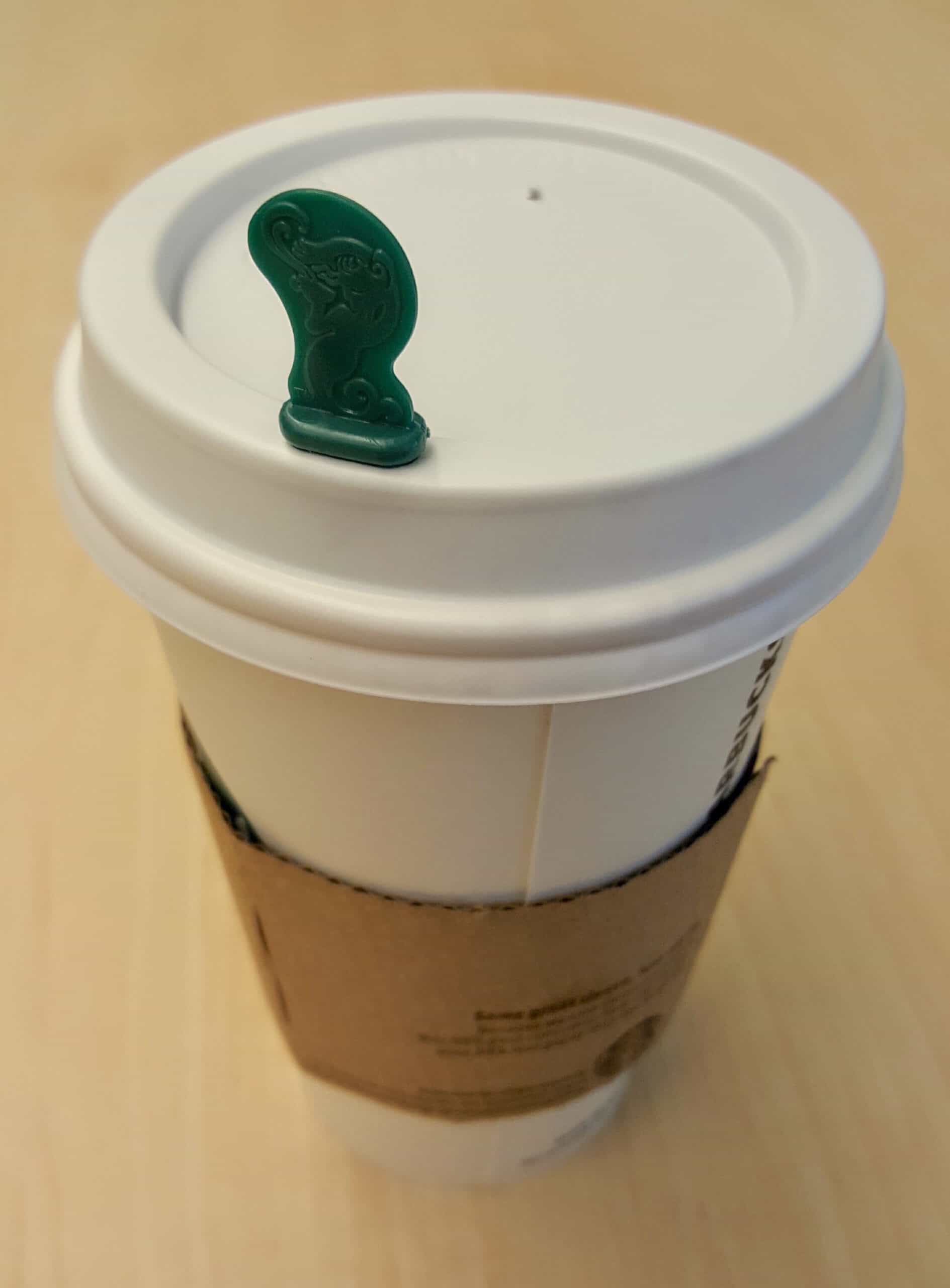 Starbucks cup with lid and stopper