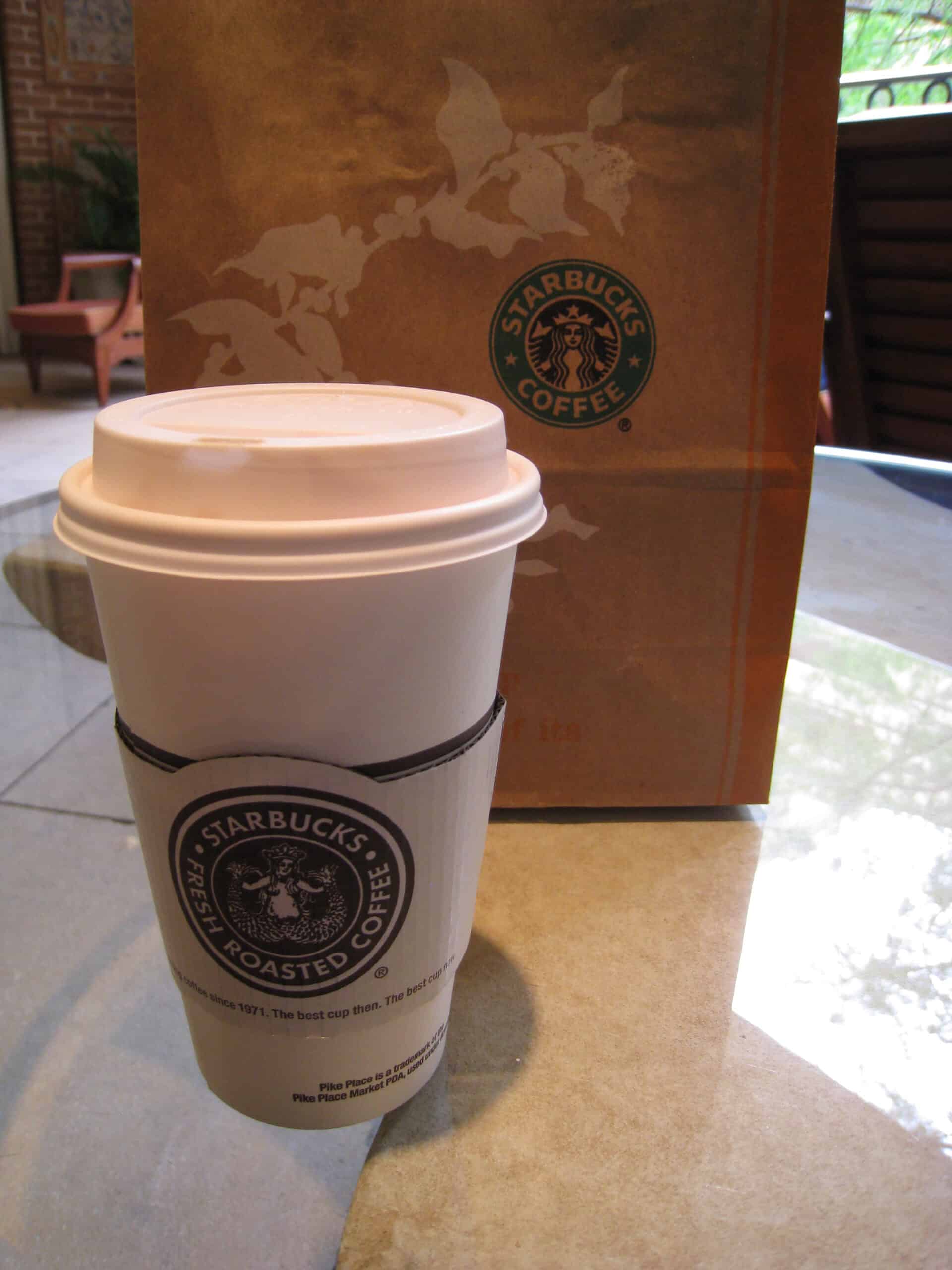 Starbucks cup and bakery bag