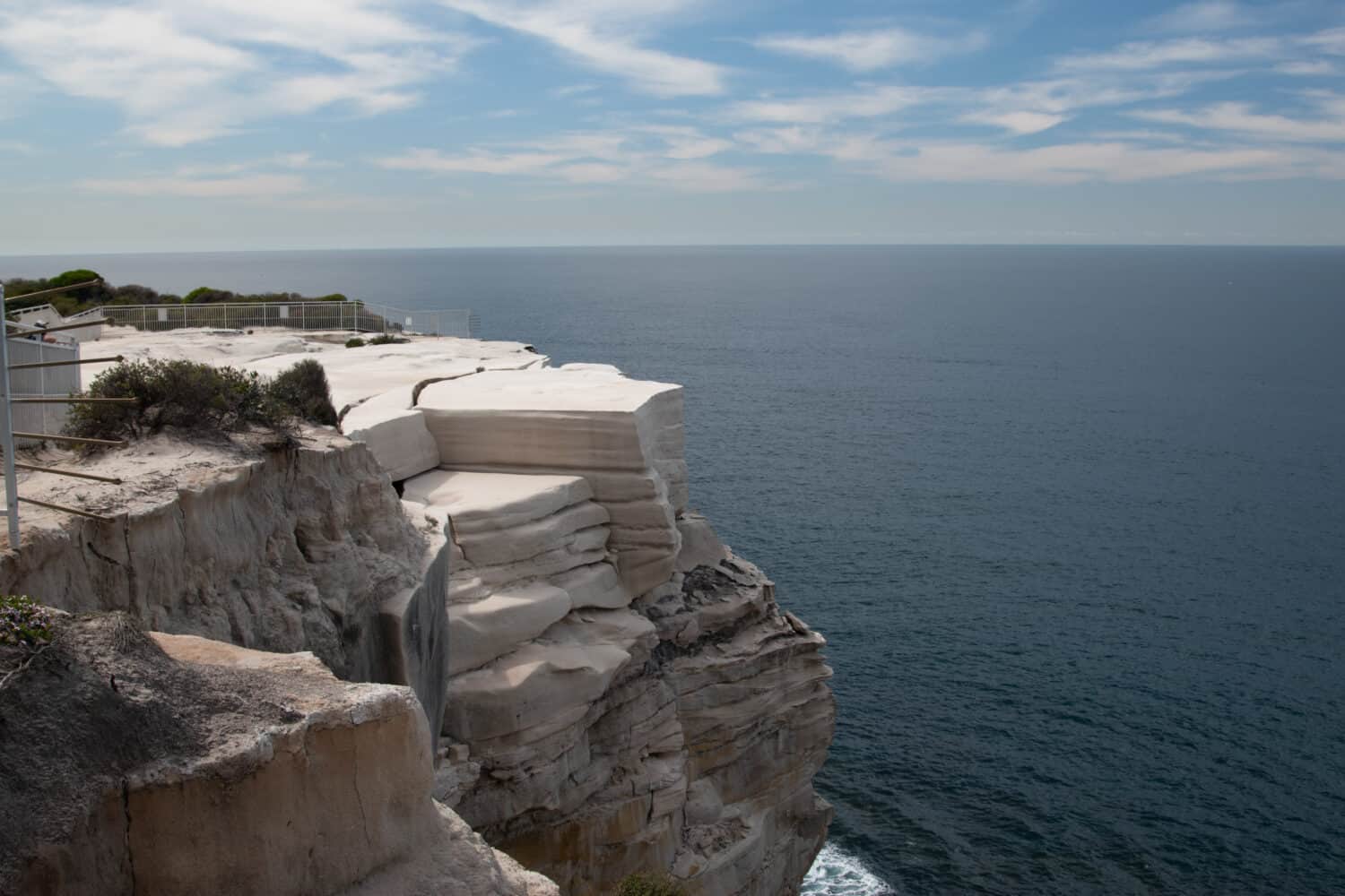 Beautiful view on popular tourist attraction: Wedding Cake Rock, a natural rock formation located along the cliffs of Sydney Royal National Park