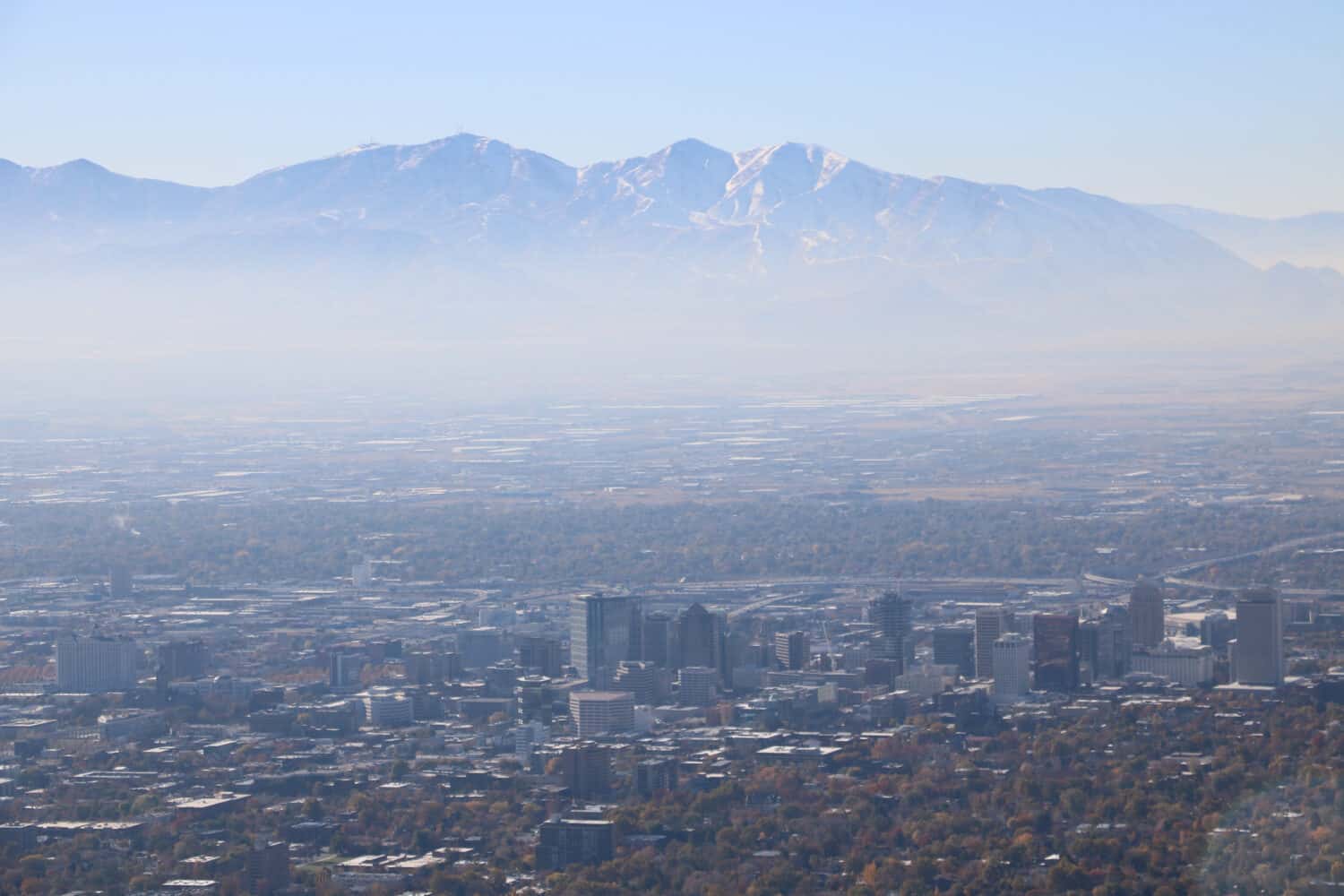 Layer of smog blankets Salt Lake City in late autumn, Utah, USA