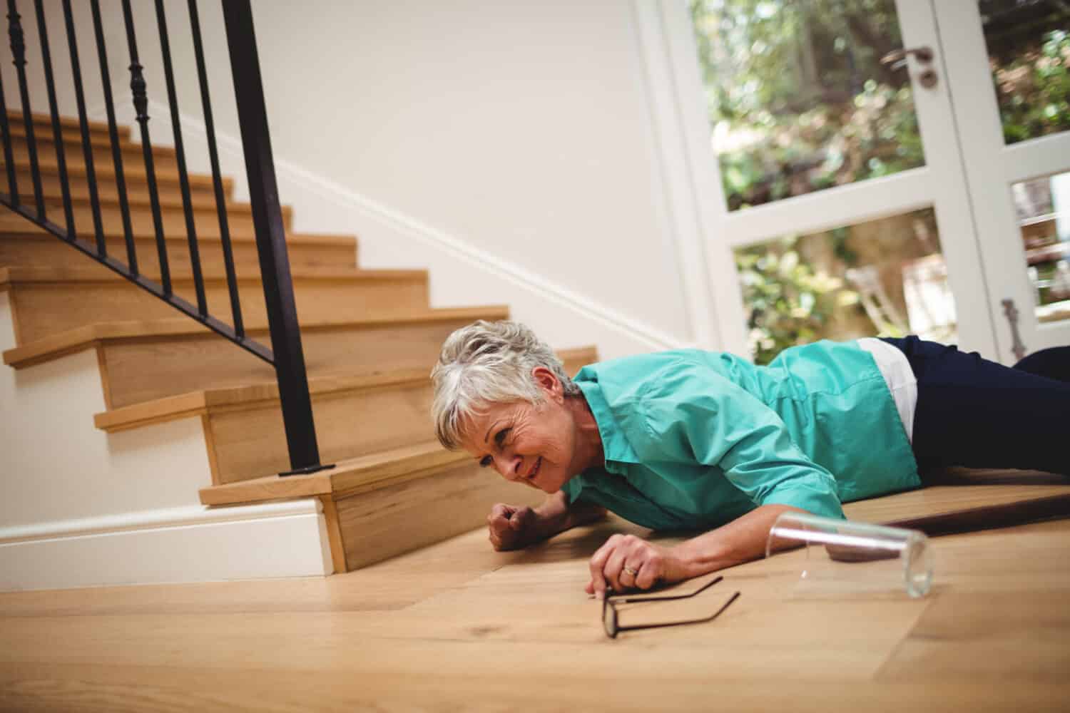 Senior woman fallen down from stairs at home