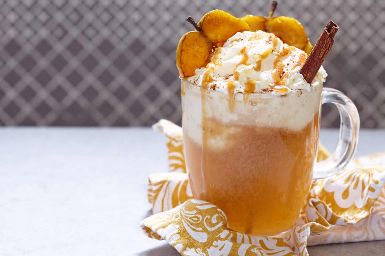 caramel apple beverage with whipped cream
