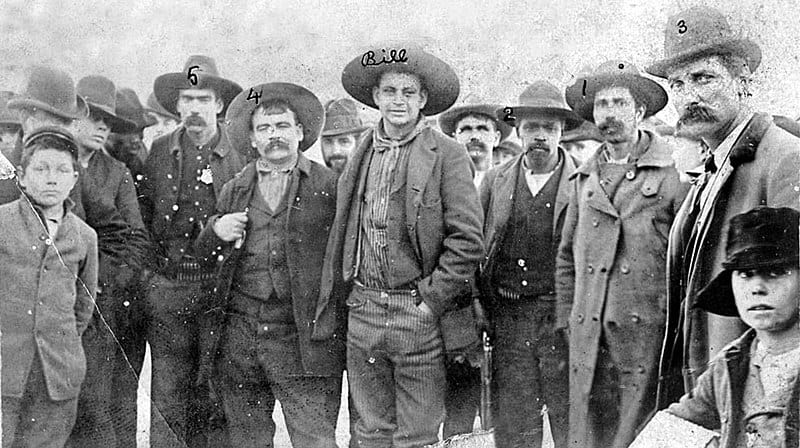 Cherokee Bill posing with captors