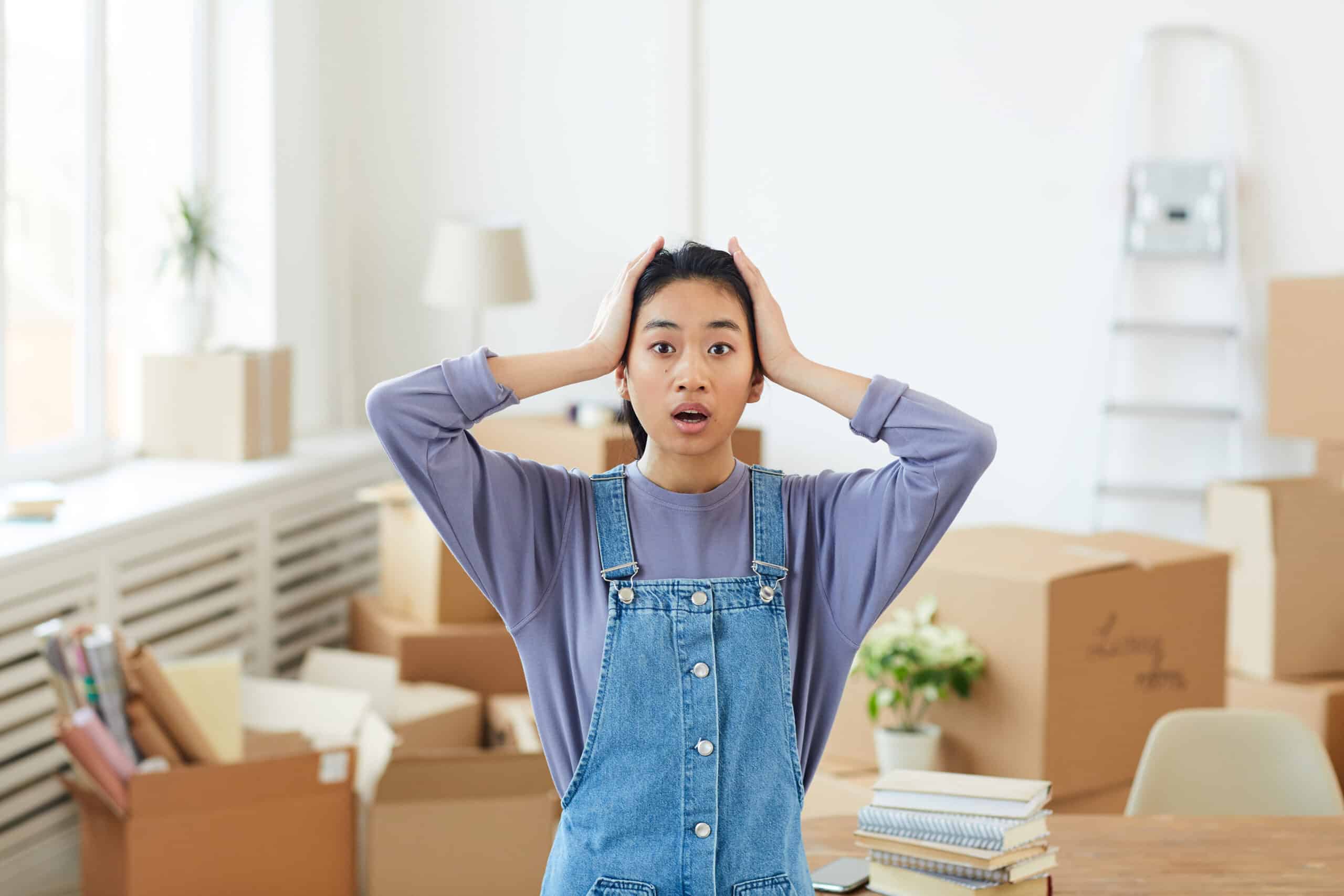 Young Asian Woman Panicking when Moving Out
