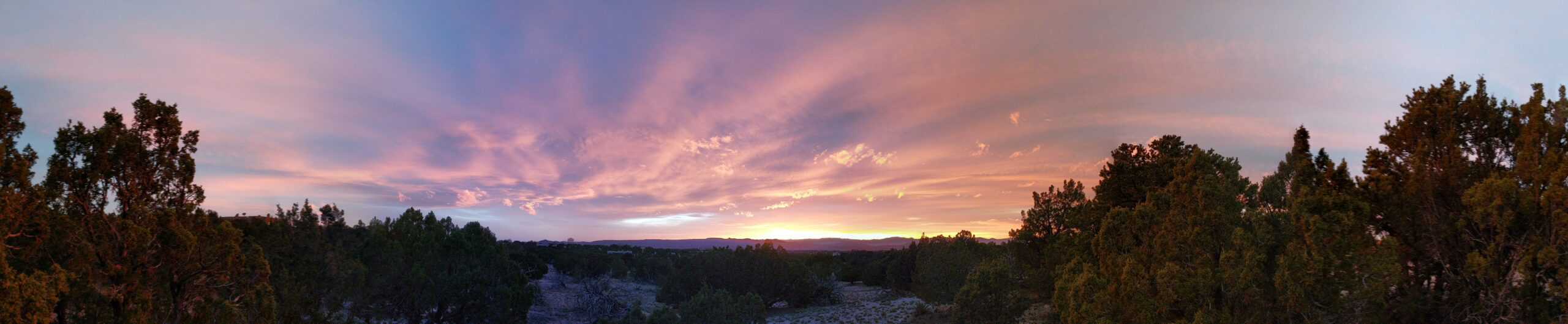 Panoramic sunset over desert outside Santa Fe by Grendelkhan