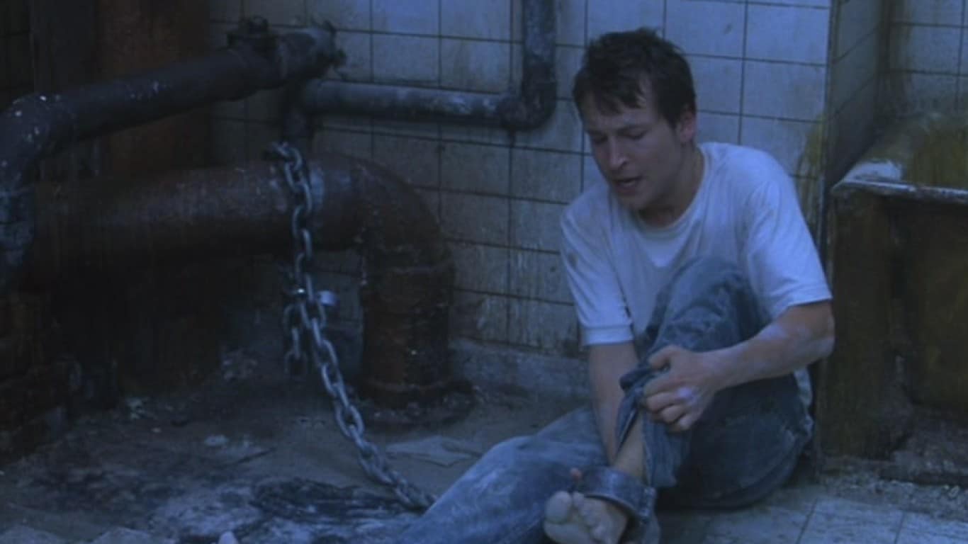 Saw (2004) | Leigh Whannell in Saw (2004)
