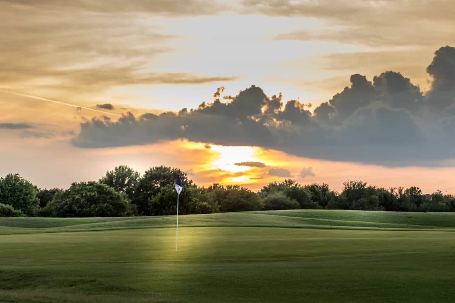 Texas golf course fairway at sunset