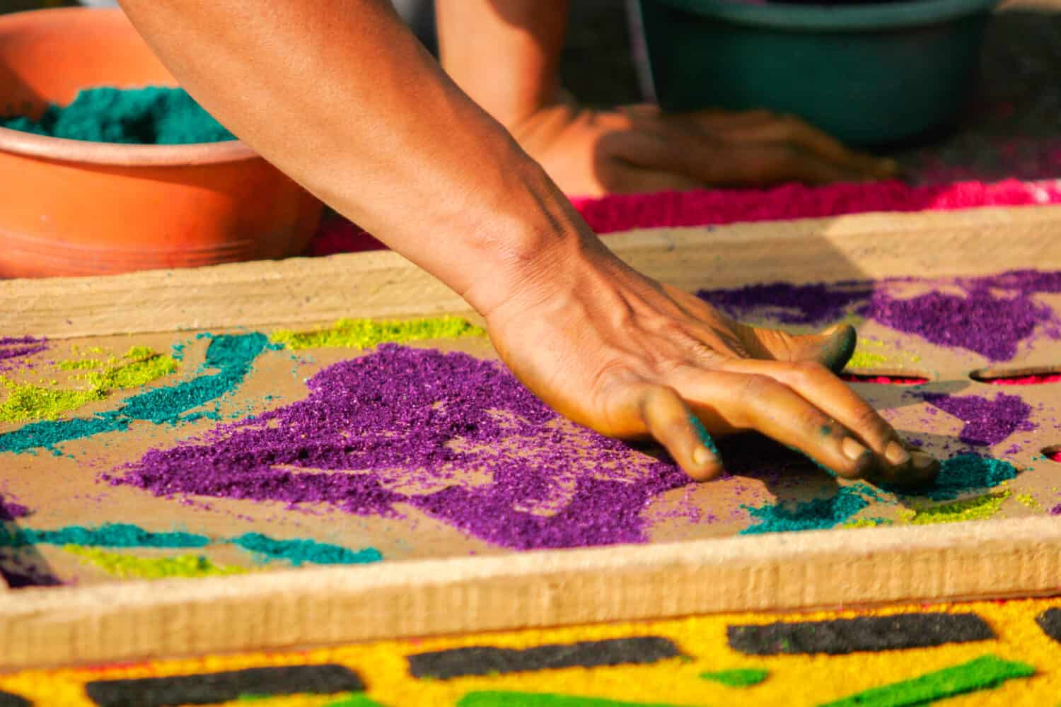 Process of a traditional sawdust carpet in the Holy Week in Antigua Guatemala, Central America.