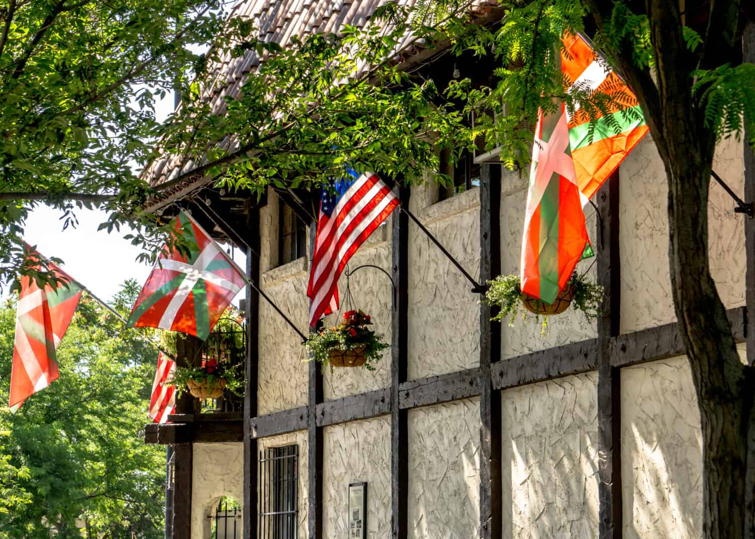 Flags waving on a historic building in downtown Boise's Basque district