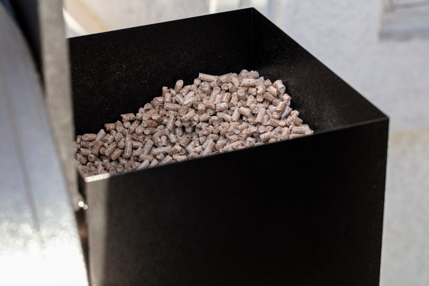 Wood pellets in a smoker pellet box for barbecue