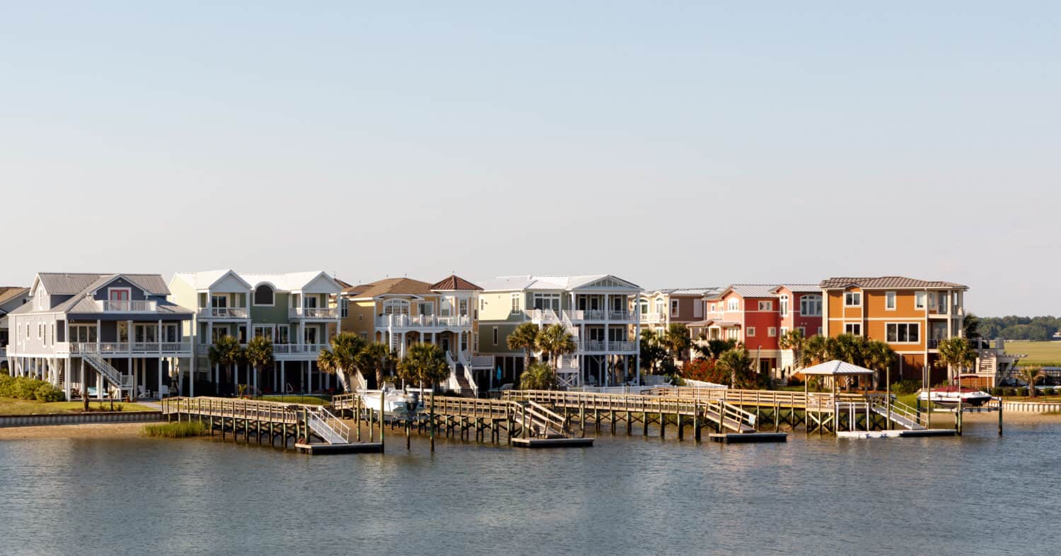 Wide angle view of luxury beach rental houses on the intercoastal waterway, Sunset Beach, North Carolina