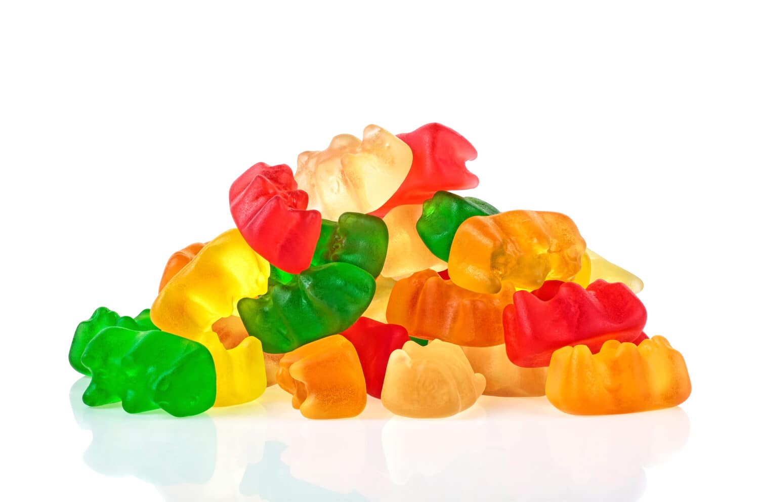 Pile of multicolored jelly bears candy on a white background. Jelly Bean.