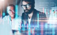 Double exposure.Two stock traiders making analysis of digital market and investment in block chain crypto currency. Stock trade concept