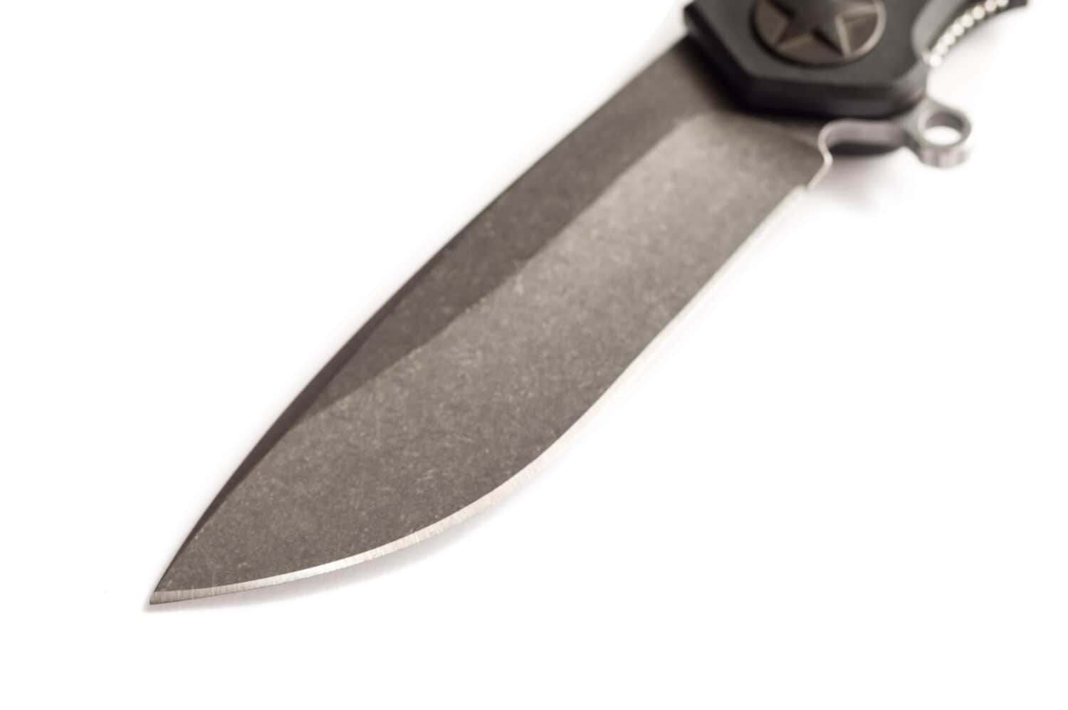 Knife with an unusual blade. The blade of the knife at an angle on the diagonal.
