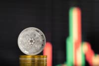 ADA crypto coin front of it's exchange rate.