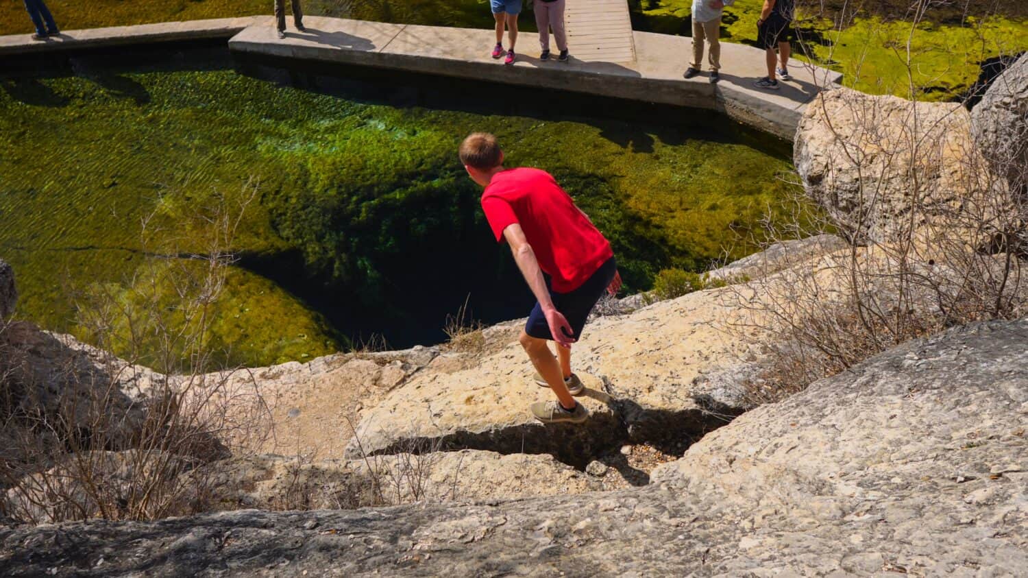 Hiker at Jacob’s Well in Wimberley, TX