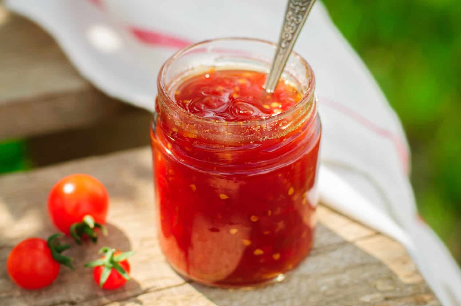 Tomato and Chili Jam Preserves in a Clear Jar, copy space for your text