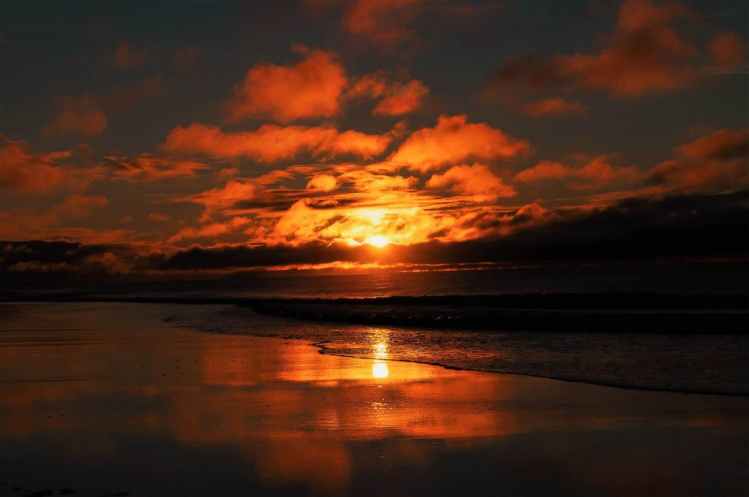 Sunrise shining through the clouds on Pine Knoll Shores, North Carolina