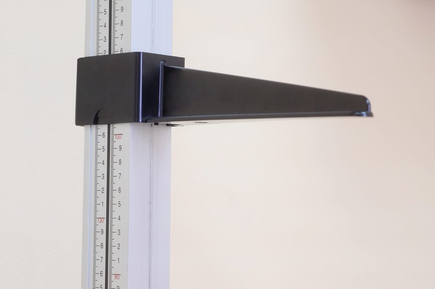 Closeup of a stadiometer, a human height measuring device