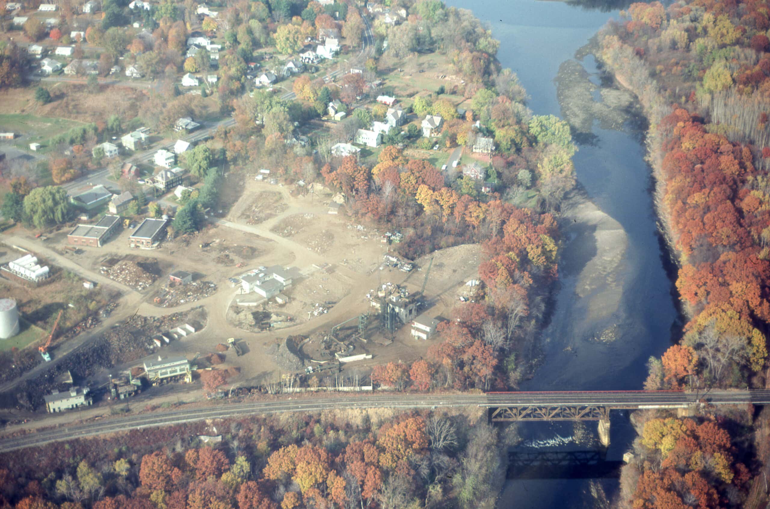Aerial view of auto shredder and railroad bridge in Greenfield, 1982 by Massachusetts Dept. of Environmental Protection