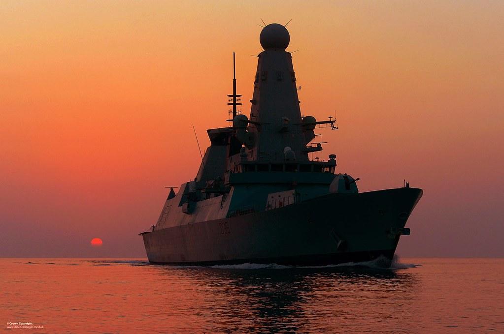 HMS Dragon at Sunset by Defence Images