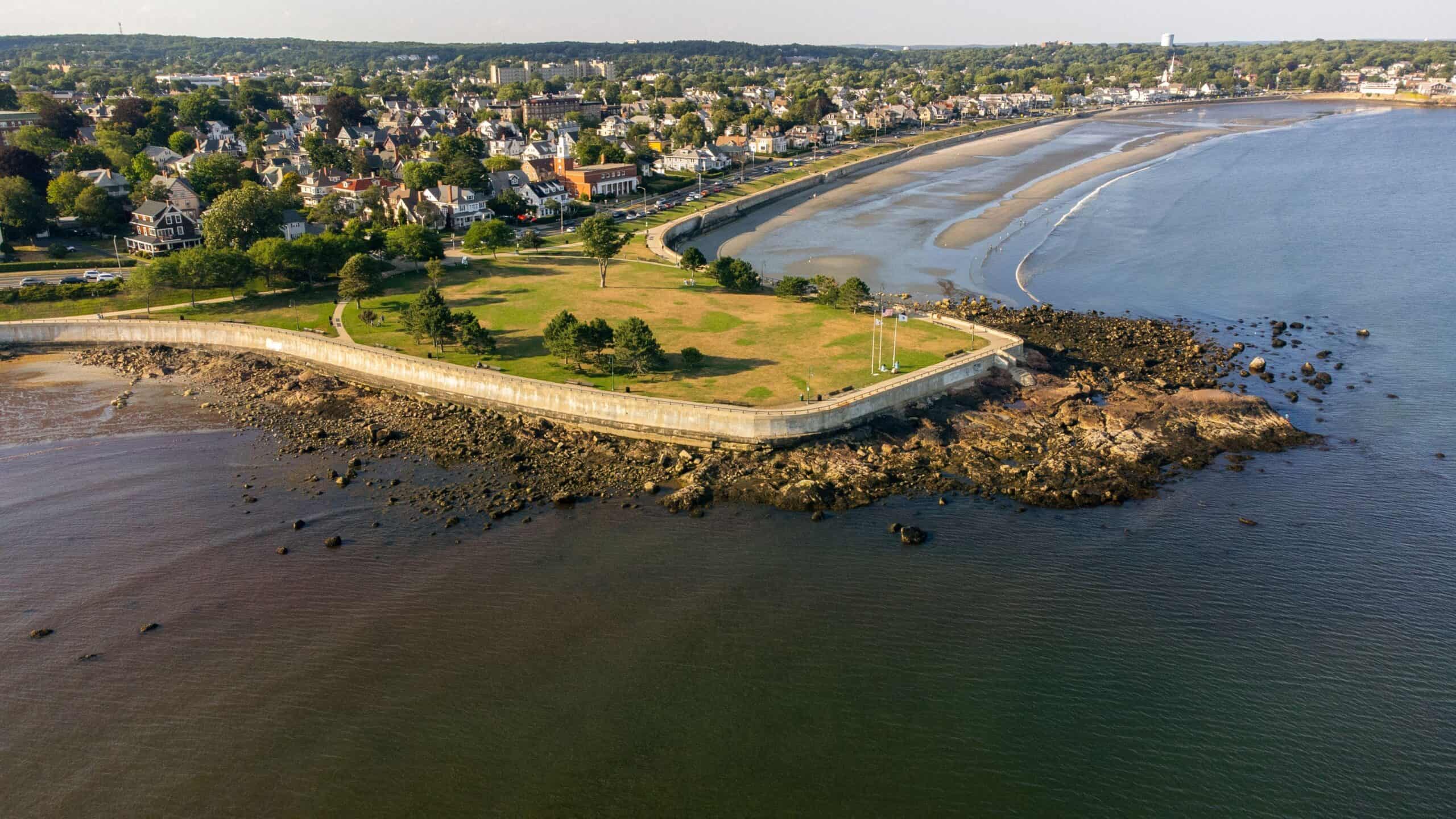 Lynn, Massachusetts | Drone view of Red Rock Park on the Lynn Shore with coastline cityscape on sunny day, Massachusetts